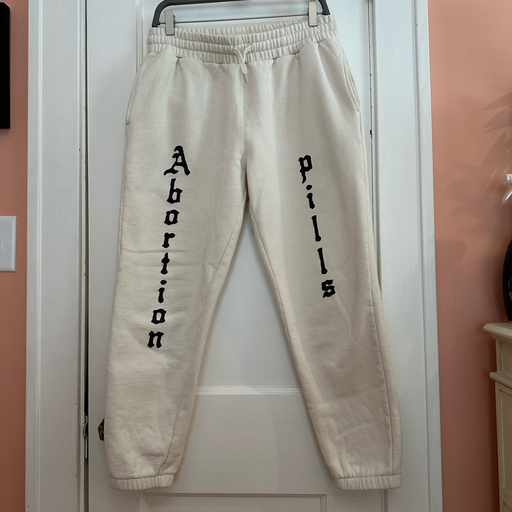 “Abortion Pills” Cream Sweatpants with Black Text // Women’s Large